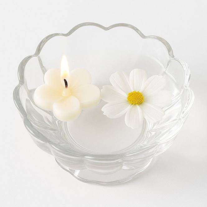 Cera velas flotantes